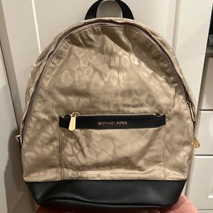 Michael Kors Black/Gold leopard backpack purse. Excellent condition.
